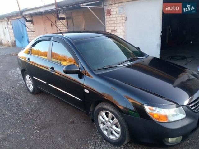 Черный Киа Черато, объемом двигателя 1.6 л и пробегом 228 тыс. км за 4300 $, фото 1 на Automoto.ua