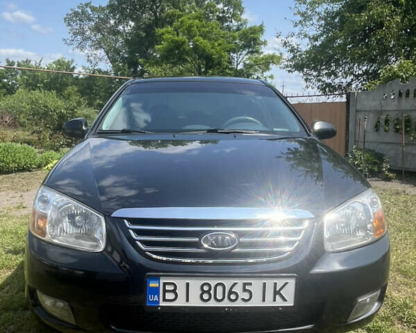 Черный Киа Черато, объемом двигателя 2 л и пробегом 223 тыс. км за 4700 $, фото 1 на Automoto.ua