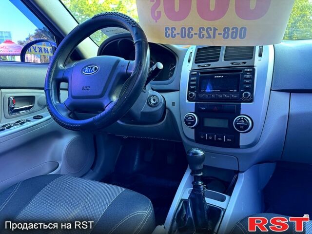 Черный Киа Черато, объемом двигателя 1.6 л и пробегом 174 тыс. км за 4550 $, фото 6 на Automoto.ua