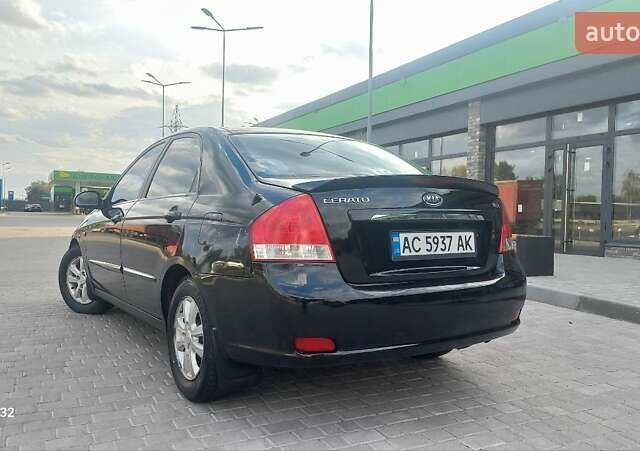 Черный Киа Черато, объемом двигателя 1.98 л и пробегом 268 тыс. км за 5200 $, фото 8 на Automoto.ua
