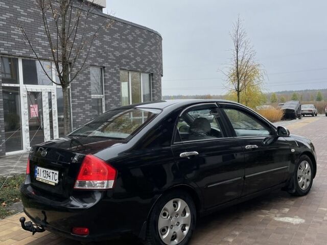 Черный Киа Черато, объемом двигателя 1.6 л и пробегом 256 тыс. км за 4200 $, фото 4 на Automoto.ua