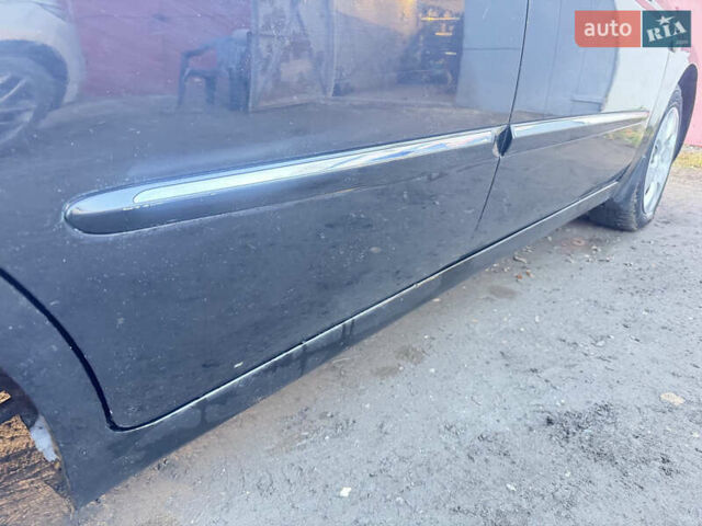 Чорний Кіа Черато, об'ємом двигуна 1.59 л та пробігом 250 тис. км за 4300 $, фото 7 на Automoto.ua