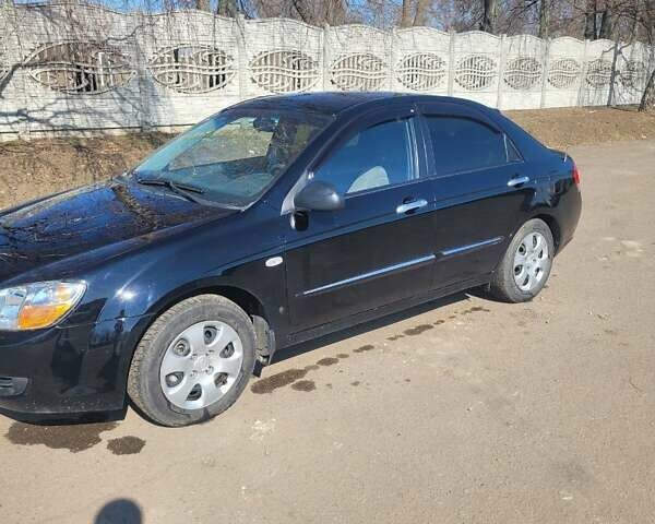 Чорний Кіа Черато, об'ємом двигуна 1.59 л та пробігом 85 тис. км за 5000 $, фото 1 на Automoto.ua