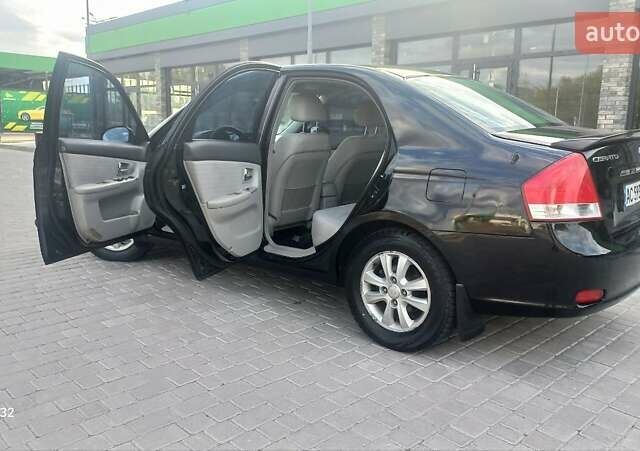 Черный Киа Черато, объемом двигателя 1.98 л и пробегом 268 тыс. км за 5200 $, фото 12 на Automoto.ua