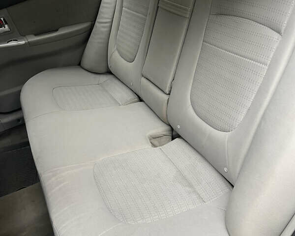 Черный Киа Черато, объемом двигателя 1.6 л и пробегом 211 тыс. км за 3200 $, фото 7 на Automoto.ua