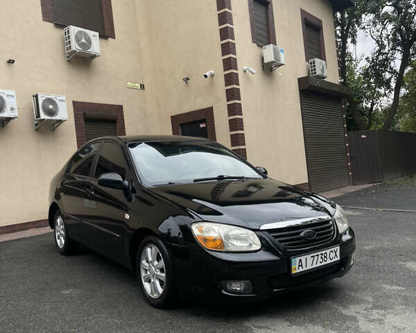 Черный Киа Черато, объемом двигателя 1.6 л и пробегом 211 тыс. км за 3200 $, фото 1 на Automoto.ua