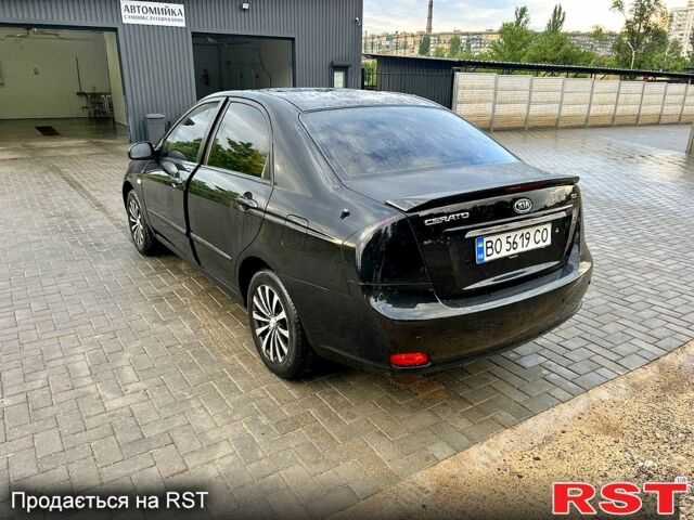 Черный Киа Черато, объемом двигателя 1.6 л и пробегом 187 тыс. км за 4999 $, фото 1 на Automoto.ua