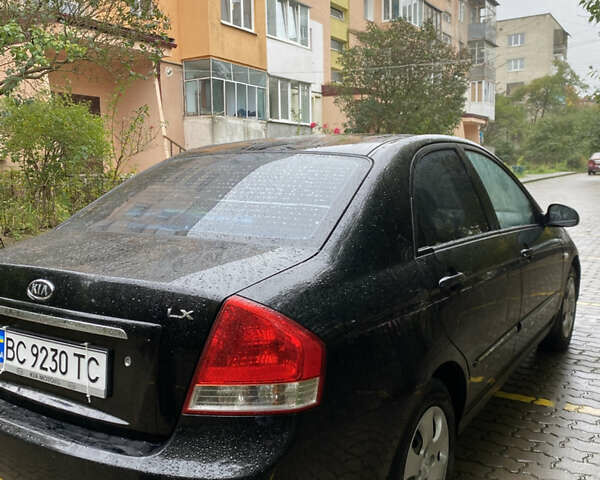 Чорний Кіа Черато, об'ємом двигуна 1.59 л та пробігом 232 тис. км за 4000 $, фото 4 на Automoto.ua