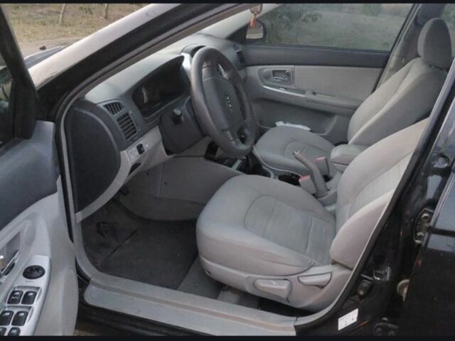 Черный Киа Черато, объемом двигателя 2 л и пробегом 290 тыс. км за 3600 $, фото 3 на Automoto.ua