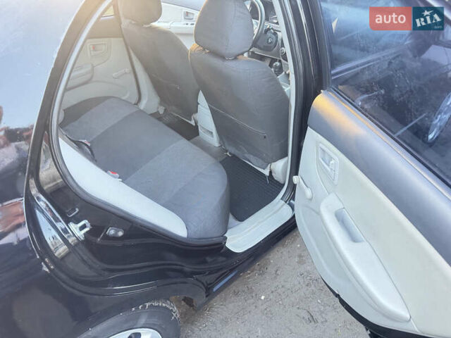 Чорний Кіа Черато, об'ємом двигуна 1.59 л та пробігом 250 тис. км за 4300 $, фото 20 на Automoto.ua