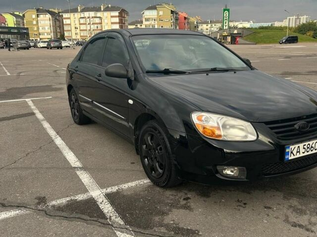 Черный Киа Черато, объемом двигателя 1.6 л и пробегом 292 тыс. км за 4000 $, фото 1 на Automoto.ua