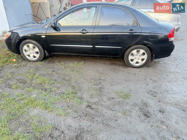 Чорний Кіа Черато, об'ємом двигуна 1.59 л та пробігом 250 тис. км за 4300 $, фото 5 на Automoto.ua