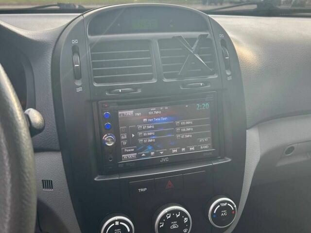 Черный Киа Черато, объемом двигателя 1.6 л и пробегом 292 тыс. км за 4000 $, фото 7 на Automoto.ua