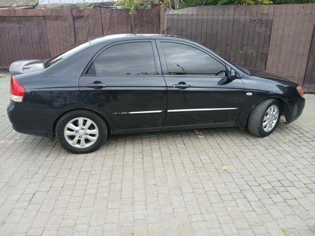 Черный Киа Черато, объемом двигателя 2 л и пробегом 250 тыс. км за 3700 $, фото 5 на Automoto.ua