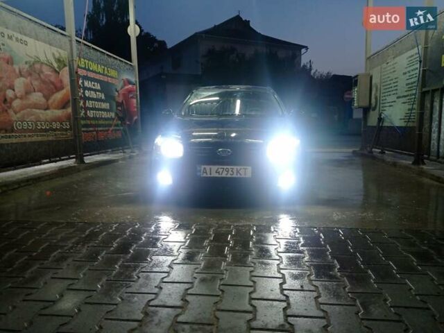 Черный Киа Черато, объемом двигателя 2 л и пробегом 340 тыс. км за 5500 $, фото 2 на Automoto.ua