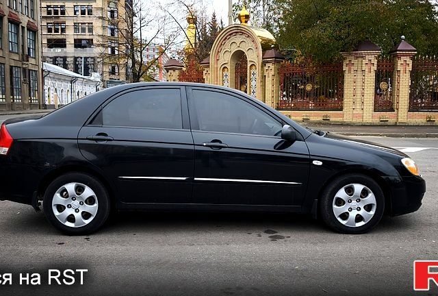 Черный Киа Черато, объемом двигателя 1.6 л и пробегом 204 тыс. км за 3700 $, фото 1 на Automoto.ua