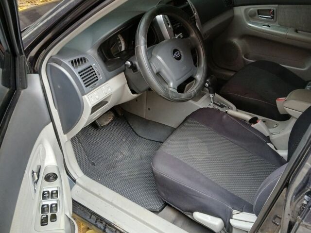 Черный Киа Черато, объемом двигателя 2 л и пробегом 250 тыс. км за 3700 $, фото 10 на Automoto.ua