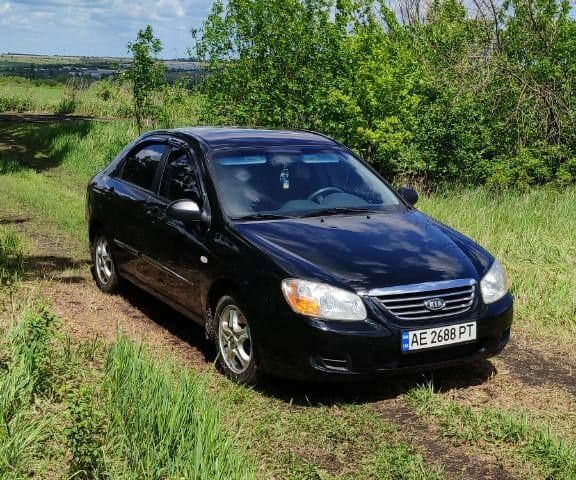 Черный Киа Черато, объемом двигателя 1.6 л и пробегом 278 тыс. км за 4350 $, фото 2 на Automoto.ua