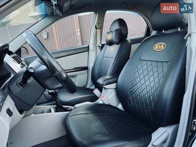 Киа Черато 2007 в Черновцах на Automoto.ua Черный Киа Черато, объемом двигателя 1.6 л и пробегом 210 тыс. км за 3950 $, фото 29 на Automoto.ua