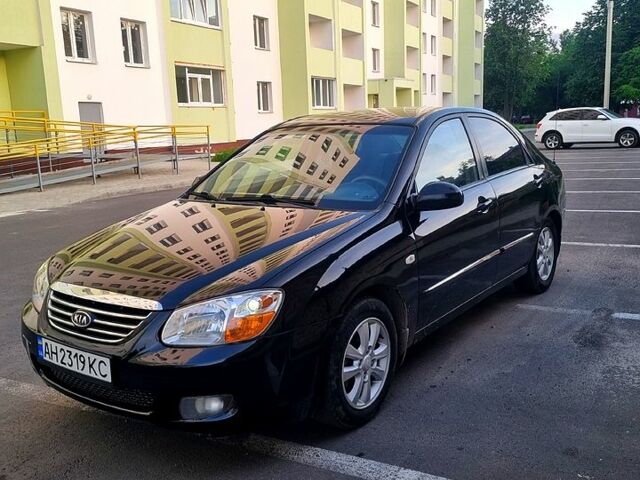 Черный Киа Черато, объемом двигателя 1.6 л и пробегом 200 тыс. км за 3999 $, фото 6 на Automoto.ua