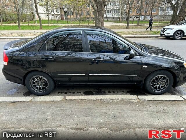 Черный Киа Черато, объемом двигателя 1.6 л и пробегом 230 тыс. км за 3700 $, фото 2 на Automoto.ua