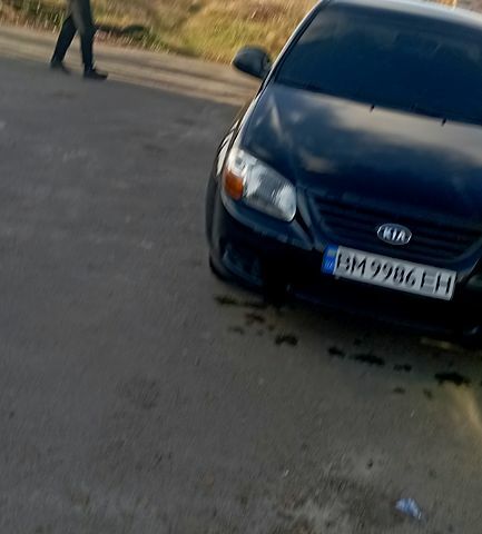 Кіа Черато 2007 у Сумах на Automoto.ua Чорний Кіа Черато, об'ємом двигуна 1.6 л та пробігом 221 тис. км за 4500 $, фото 6 на Automoto.ua