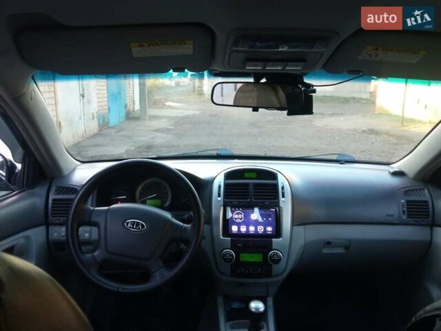 Черный Киа Черато, объемом двигателя 1.6 л и пробегом 228 тыс. км за 4300 $, фото 2 на Automoto.ua