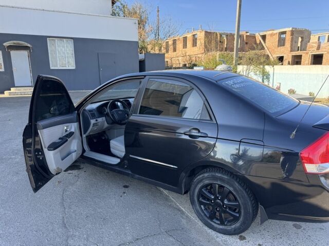 Чорний Кіа Черато, об'ємом двигуна 2 л та пробігом 362 тис. км за 3900 $, фото 5 на Automoto.ua