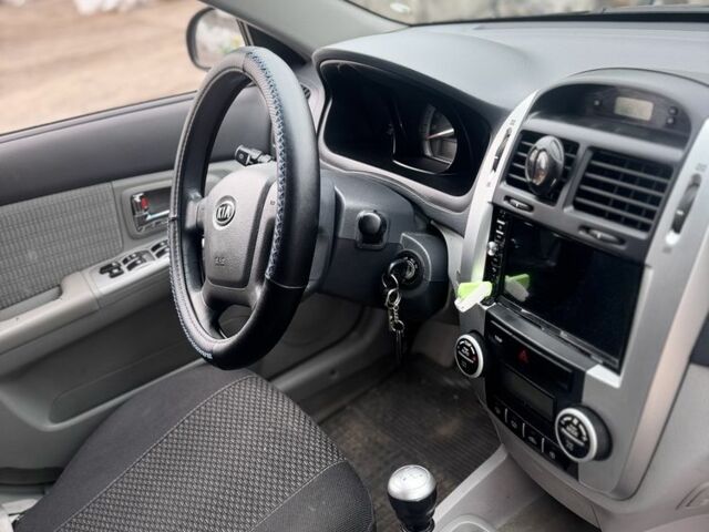 Черный Киа Черато, объемом двигателя 1.6 л и пробегом 126 тыс. км за 5200 $, фото 4 на Automoto.ua