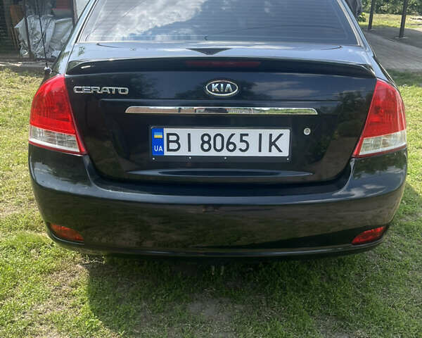 Черный Киа Черато, объемом двигателя 2 л и пробегом 223 тыс. км за 4700 $, фото 4 на Automoto.ua