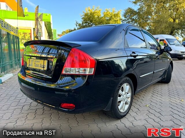 Черный Киа Черато, объемом двигателя 1.6 л и пробегом 174 тыс. км за 4550 $, фото 3 на Automoto.ua