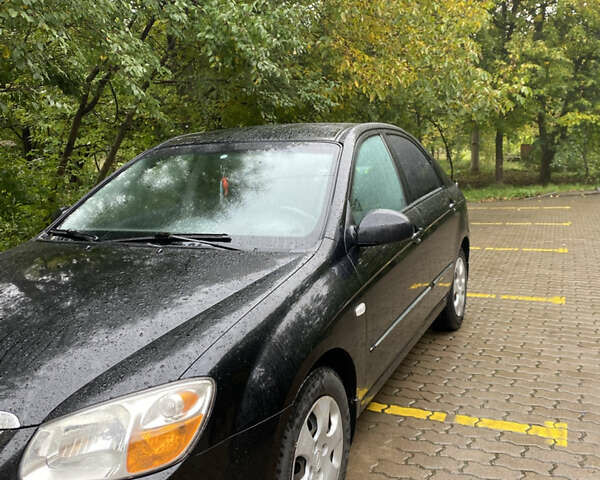 Чорний Кіа Черато, об'ємом двигуна 1.59 л та пробігом 232 тис. км за 4000 $, фото 2 на Automoto.ua