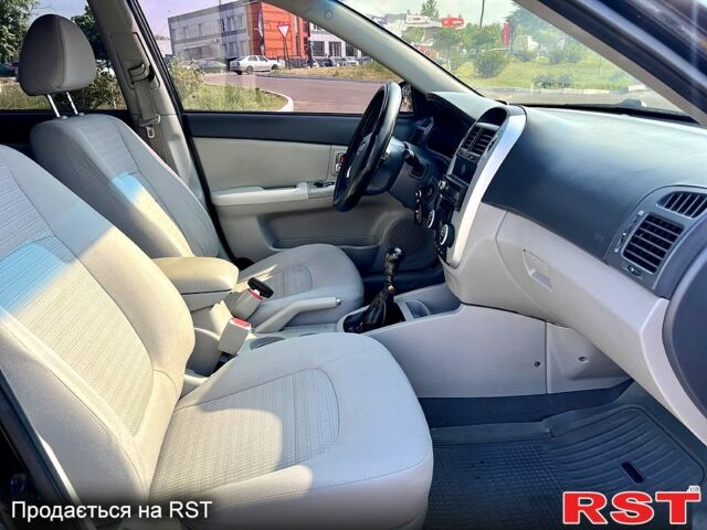 Черный Киа Черато, объемом двигателя 1.6 л и пробегом 187 тыс. км за 4999 $, фото 4 на Automoto.ua