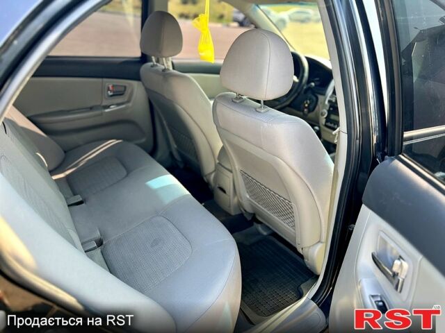Черный Киа Черато, объемом двигателя 1.6 л и пробегом 187 тыс. км за 4999 $, фото 6 на Automoto.ua
