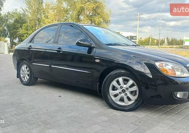 Черный Киа Черато, объемом двигателя 1.98 л и пробегом 268 тыс. км за 5200 $, фото 4 на Automoto.ua