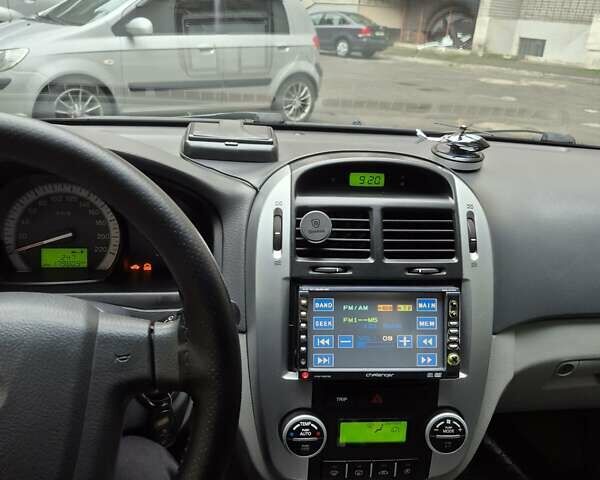 Черный Киа Черато, объемом двигателя 1.98 л и пробегом 180 тыс. км за 4500 $, фото 2 на Automoto.ua