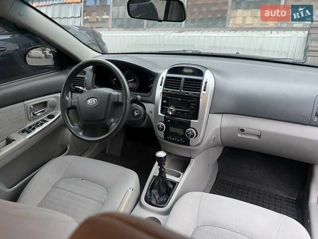 Черный Киа Черато, объемом двигателя 1.6 л и пробегом 180 тыс. км за 4900 $, фото 9 на Automoto.ua