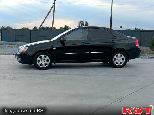 Черный Киа Черато, объемом двигателя 1.6 л и пробегом 210 тыс. км за 4000 $, фото 3 на Automoto.ua