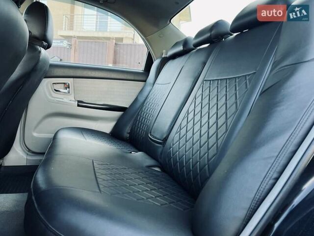 Черный Киа Черато, объемом двигателя 1.6 л и пробегом 210 тыс. км за 3650 $, фото 31 на Automoto.ua