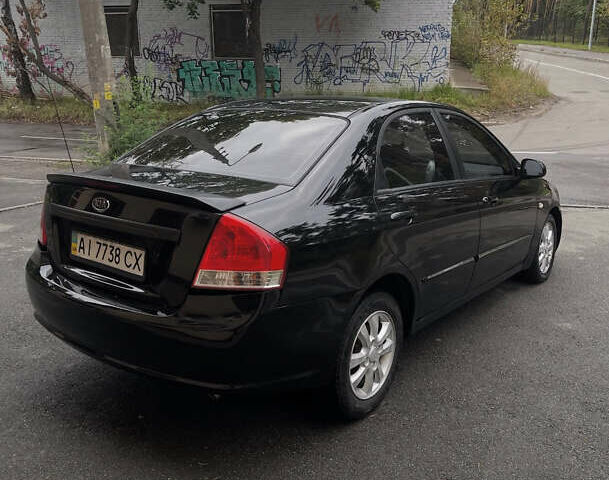 Черный Киа Черато, объемом двигателя 1.59 л и пробегом 273 тыс. км за 2999 $, фото 3 на Automoto.ua