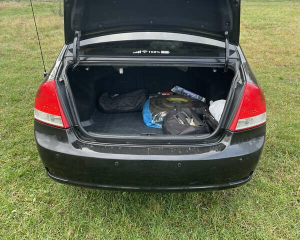 Черный Киа Черато, объемом двигателя 1.98 л и пробегом 315 тыс. км за 5745 $, фото 8 на Automoto.ua