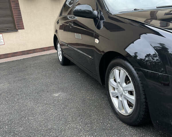 Черный Киа Черато, объемом двигателя 1.6 л и пробегом 211 тыс. км за 3200 $, фото 8 на Automoto.ua