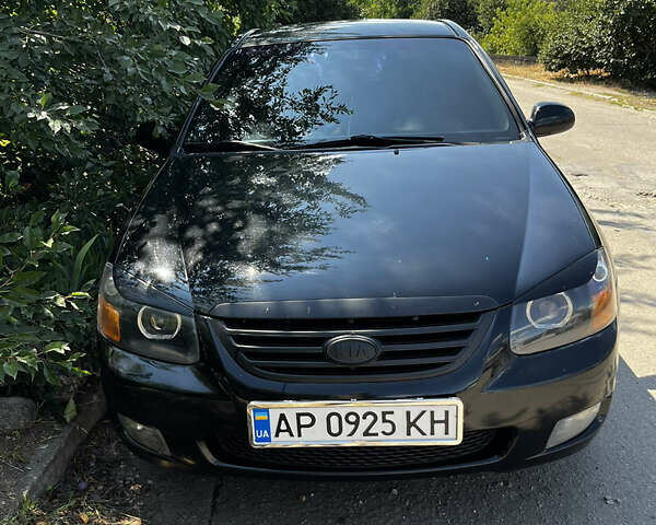 Черный Киа Черато, объемом двигателя 1.59 л и пробегом 314 тыс. км за 5000 $, фото 5 на Automoto.ua