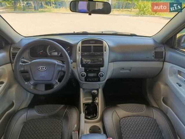 Чорний Кіа Черато, об'ємом двигуна 1.59 л та пробігом 219 тис. км за 4600 $, фото 41 на Automoto.ua