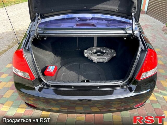 Черный Киа Черато, объемом двигателя 1.6 л и пробегом 190 тыс. км за 4350 $, фото 5 на Automoto.ua