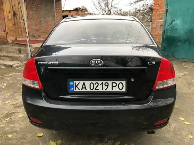 Черный Киа Черато, объемом двигателя 1.6 л и пробегом 240 тыс. км за 3300 $, фото 5 на Automoto.ua