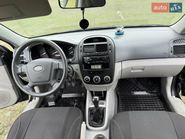 Черный Киа Черато, объемом двигателя 1.59 л и пробегом 312 тыс. км за 3000 $, фото 13 на Automoto.ua