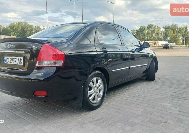 Черный Киа Черато, объемом двигателя 1.98 л и пробегом 268 тыс. км за 5200 $, фото 16 на Automoto.ua