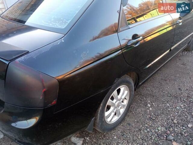 Черный Киа Черато, объемом двигателя 1.6 л и пробегом 228 тыс. км за 4300 $, фото 3 на Automoto.ua