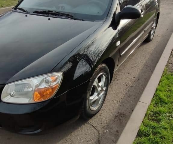 Черный Киа Черато, объемом двигателя 1.6 л и пробегом 278 тыс. км за 4350 $, фото 3 на Automoto.ua